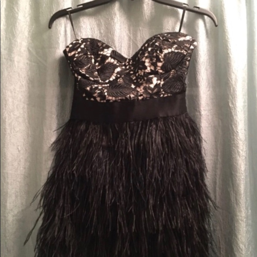 Black strapless feather dress